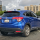 Illustration for article titled This Honda HR-V driver JUST CANT TAKE IT ANYMORE with everyone asking where the back door handles are